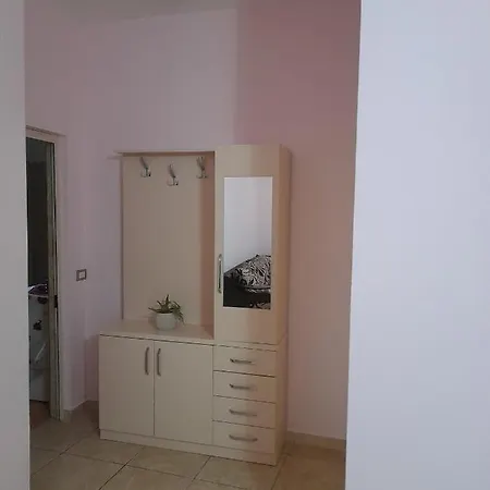 Andi * Tirana